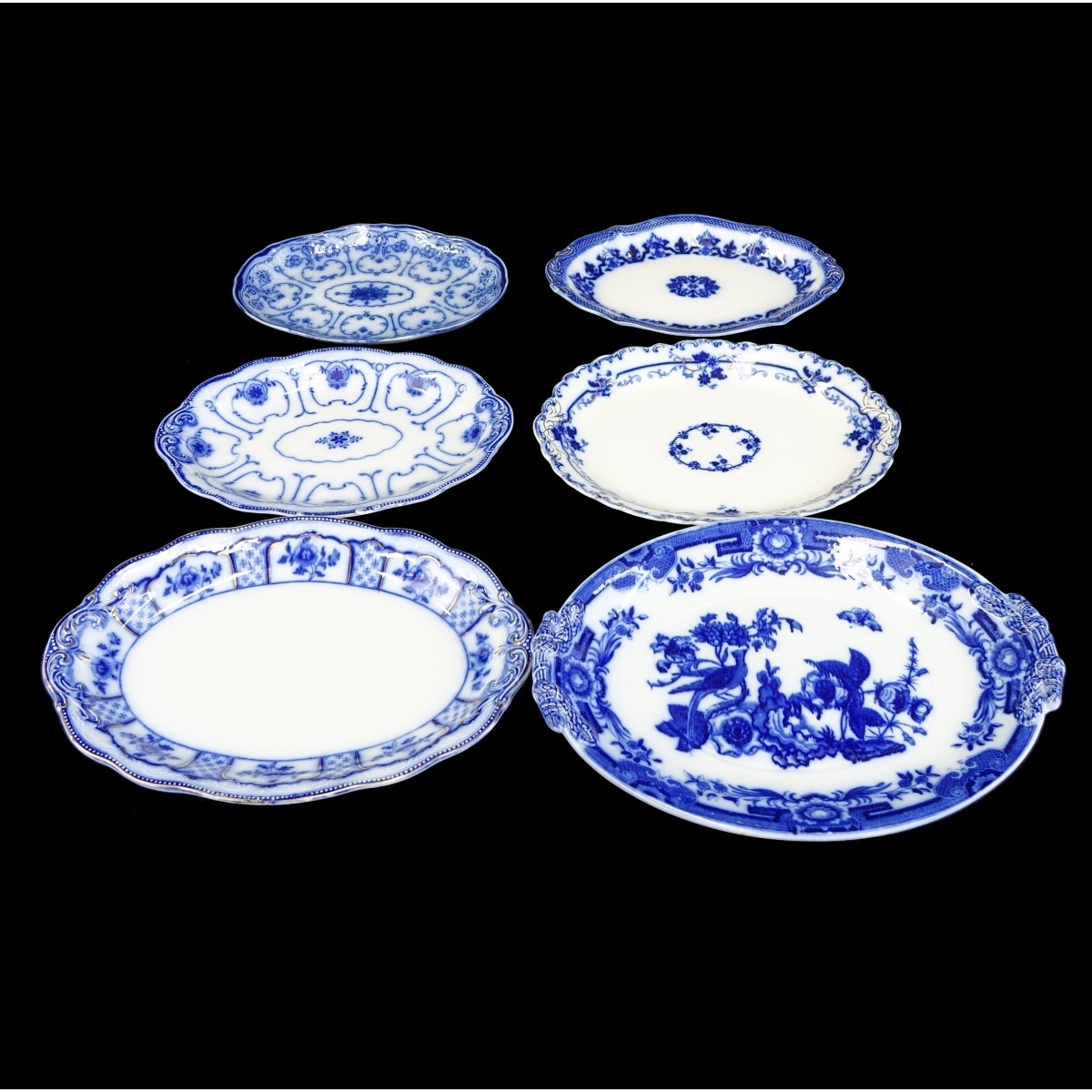 Six (6) Antique Flow Blue Oval Serving Platters
