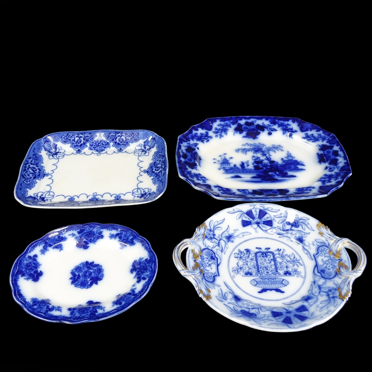 Four (4) Antique Flow Blue Serving Platters