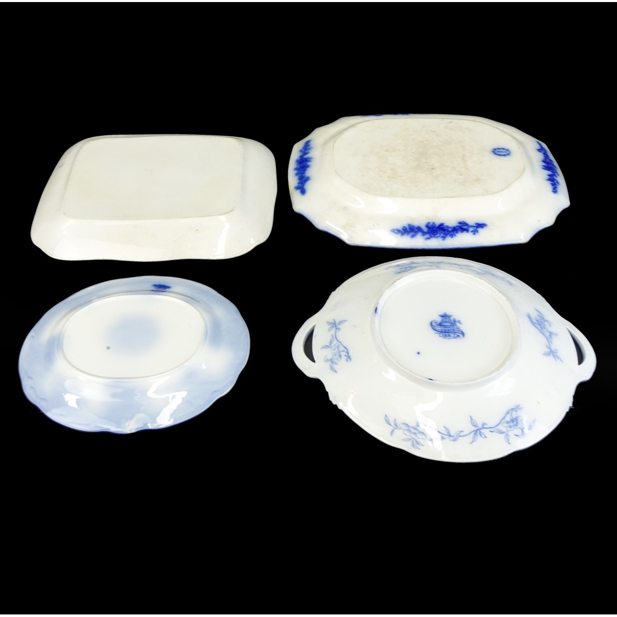 Four (4) Antique Flow Blue Serving Platters