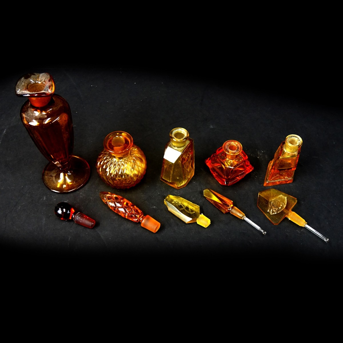 Five (5) Vintage Amber Color Perfume Bottles