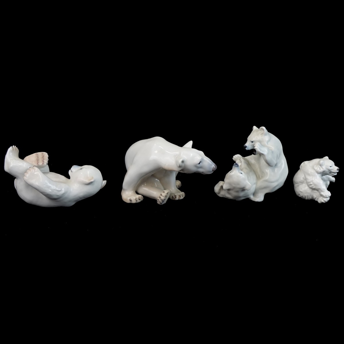 Four (4) Vintage Porcelain Polar Bear Figurines
