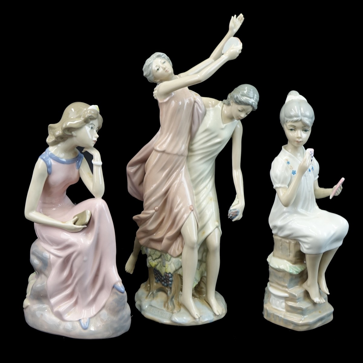 Three (3) Casades Glazed Porcelain Figurines