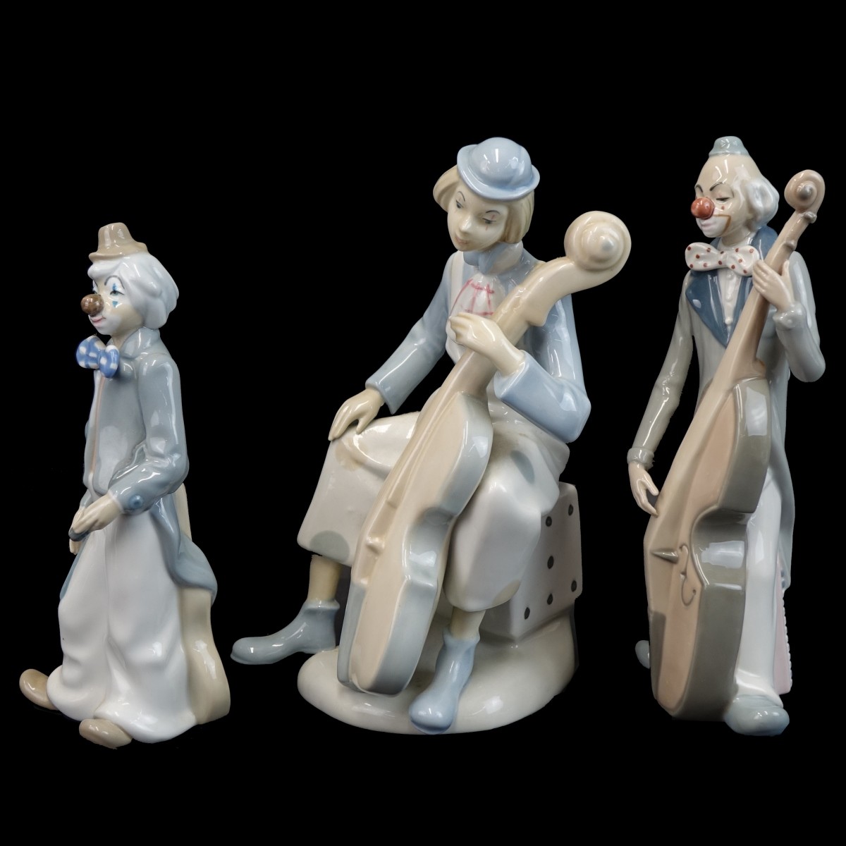 Three (3) Vintage Glazed Porcelain Figurines