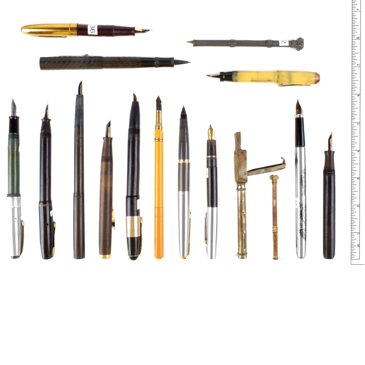 Sixteen Pens and Writing Instruments