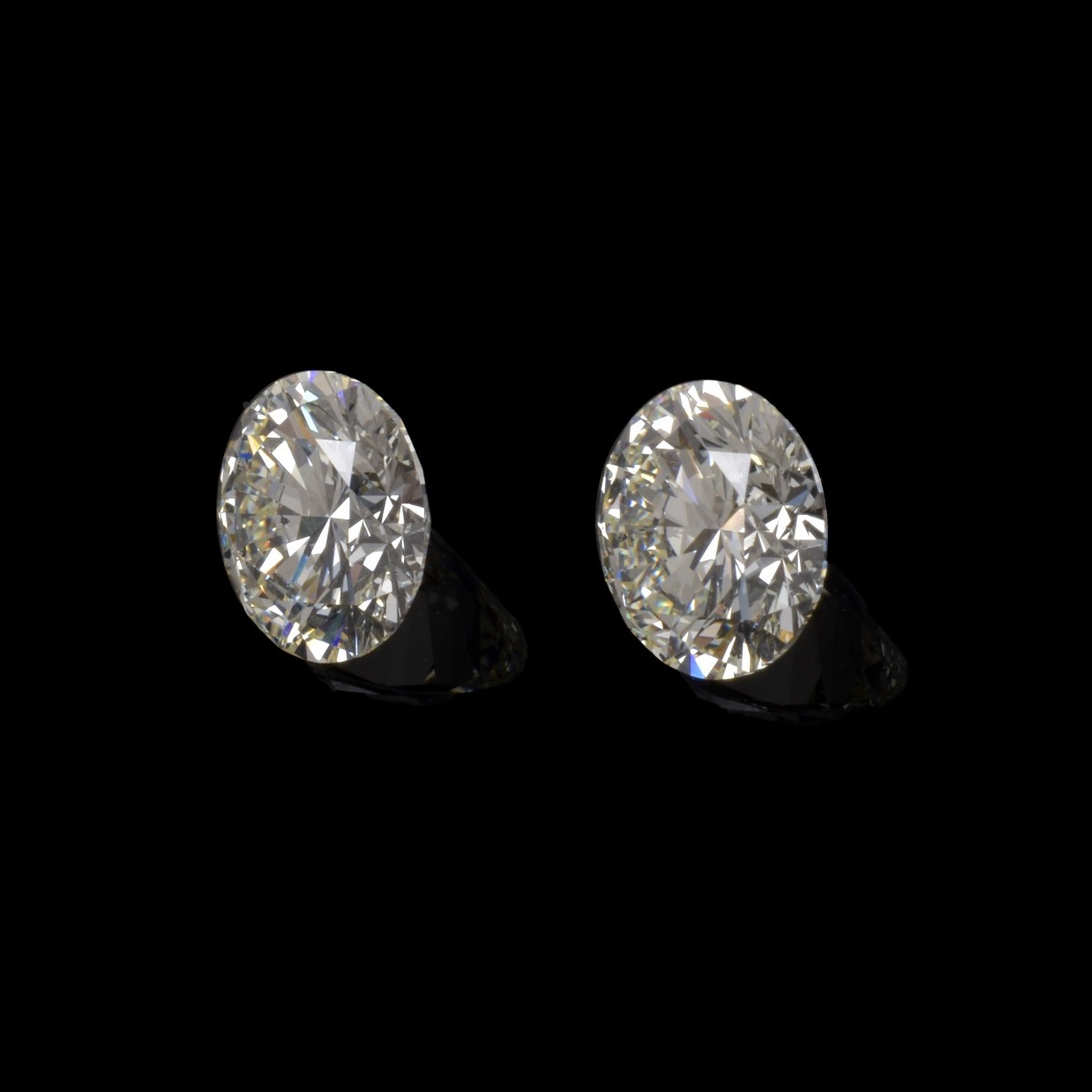 Two GIA 6.41ct TW Round Brilliant Cut Diamonds | Kodner Auctions