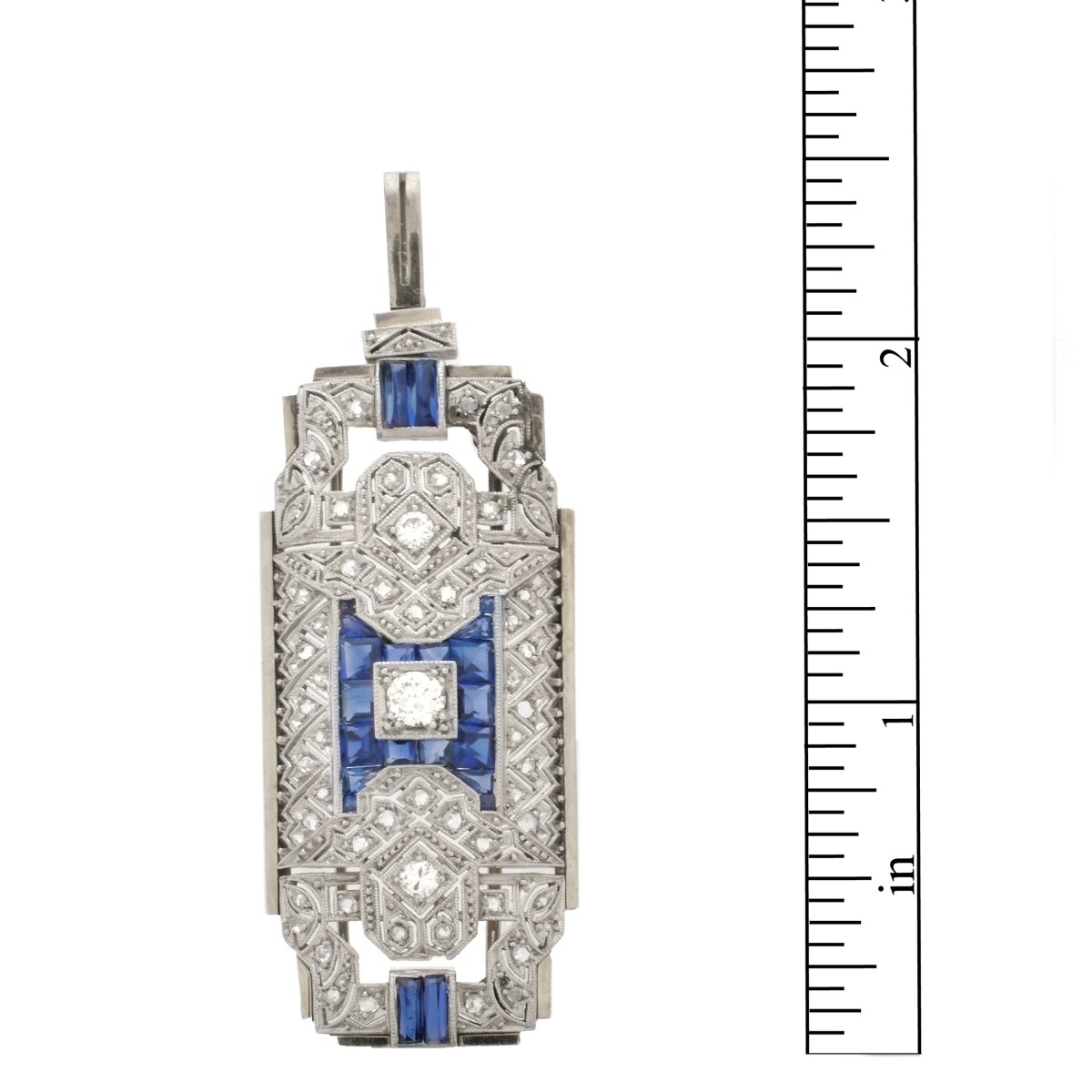 Diamond, Sapphire and 19K Pendant
