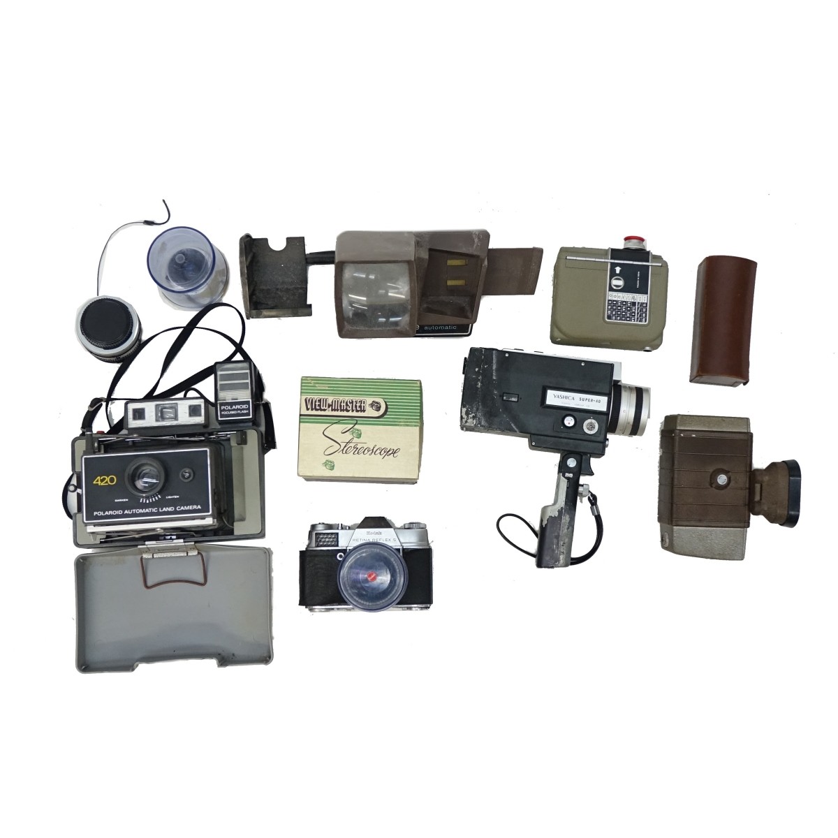 Assorted Cameras, Lenses, and Equipment.