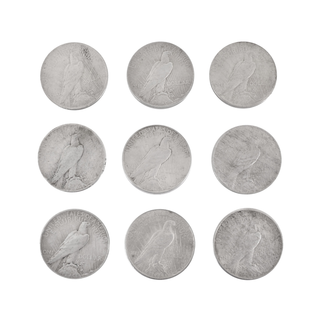 Nine US $1 Silver Peace Coins
