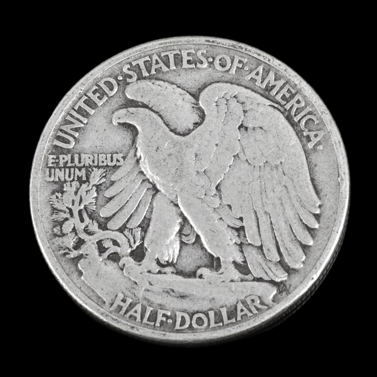 Thirteen U.S. Silver Half Dollars