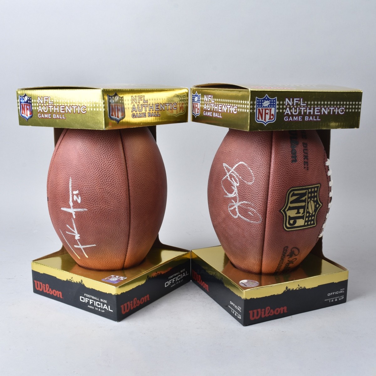 Two (2) NFL Authentic Footballs Gore & Bettis