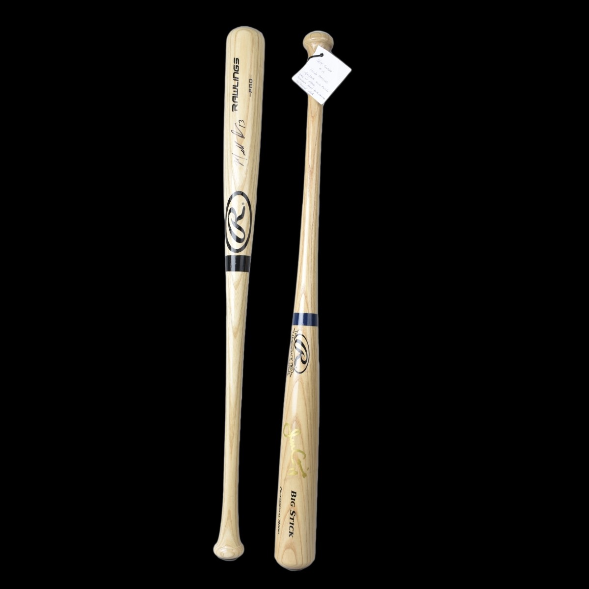 Two (2) signed Baseball Bats Conine & Ozuna