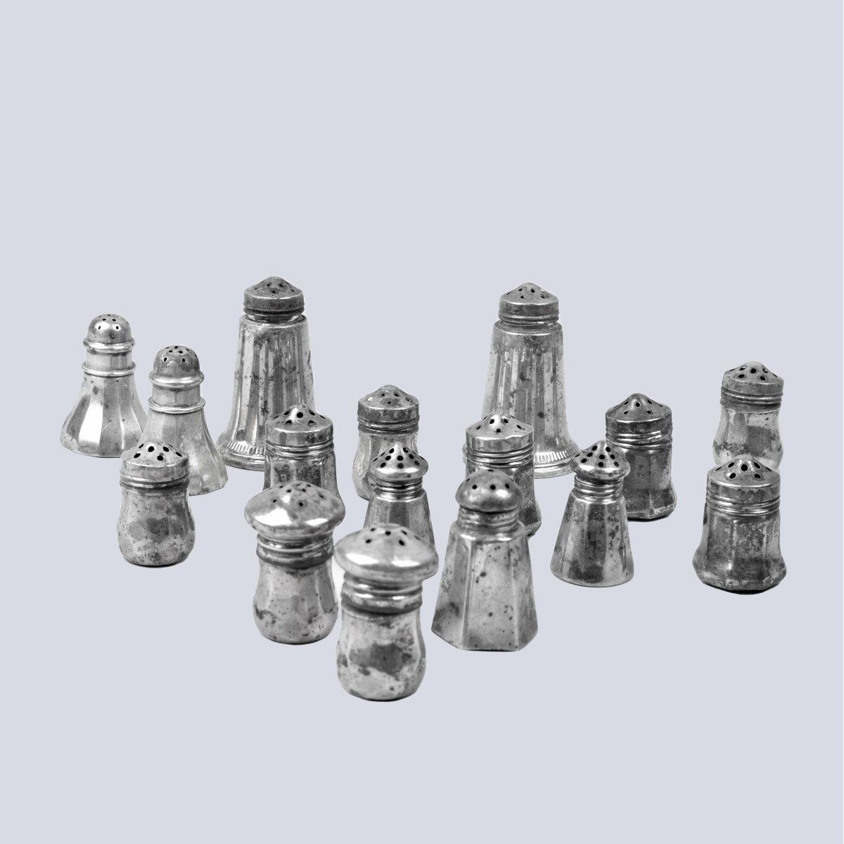 Sixteen Sterling Silver Miniature Shakers