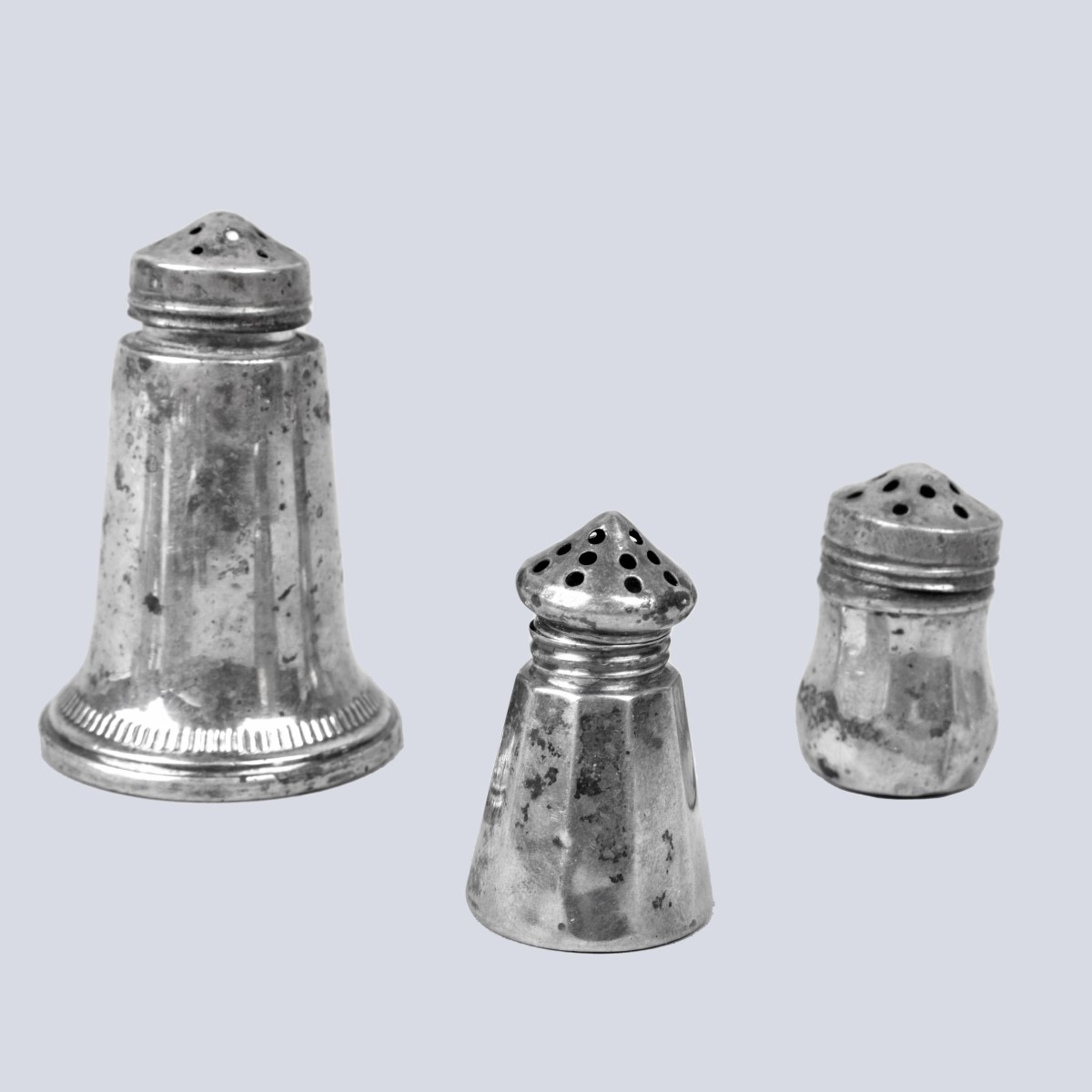 Sixteen Sterling Silver Miniature Shakers