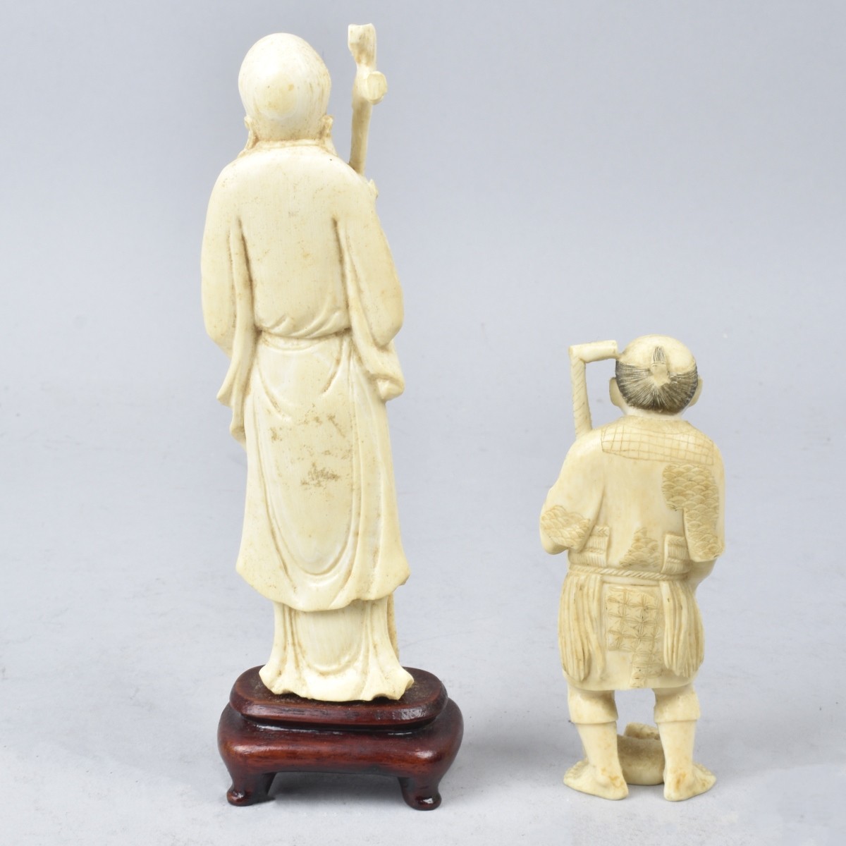 Two Oriental Carved Figurines