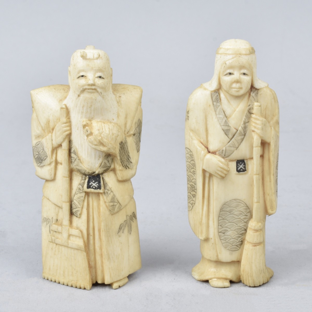 Two Japanese Okimono Figurines