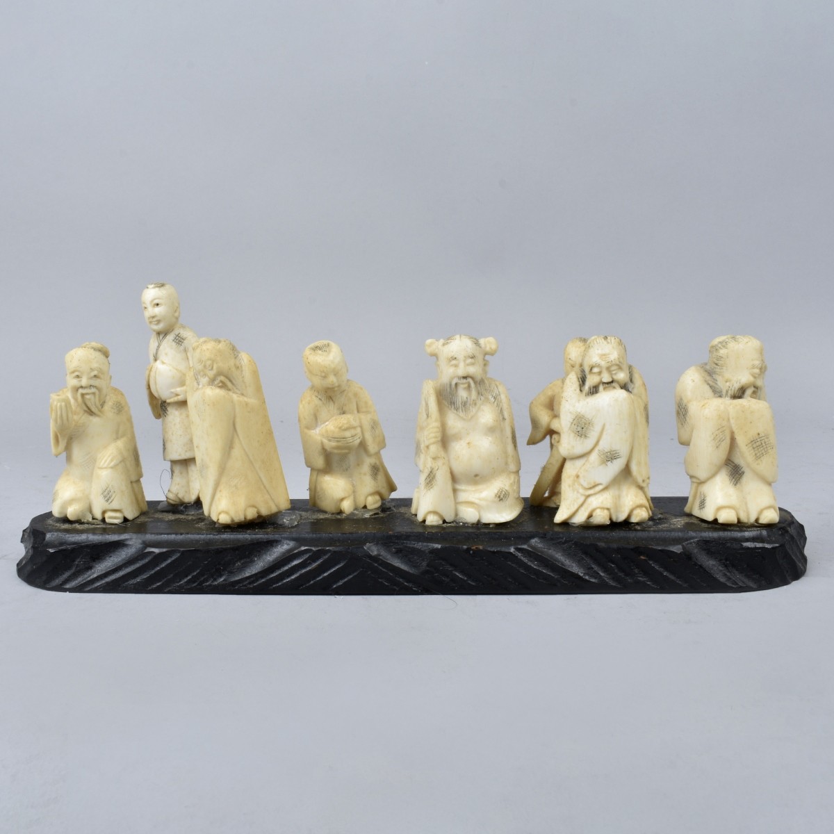 Eight Antique Japanese Carved Netsuke Figurines