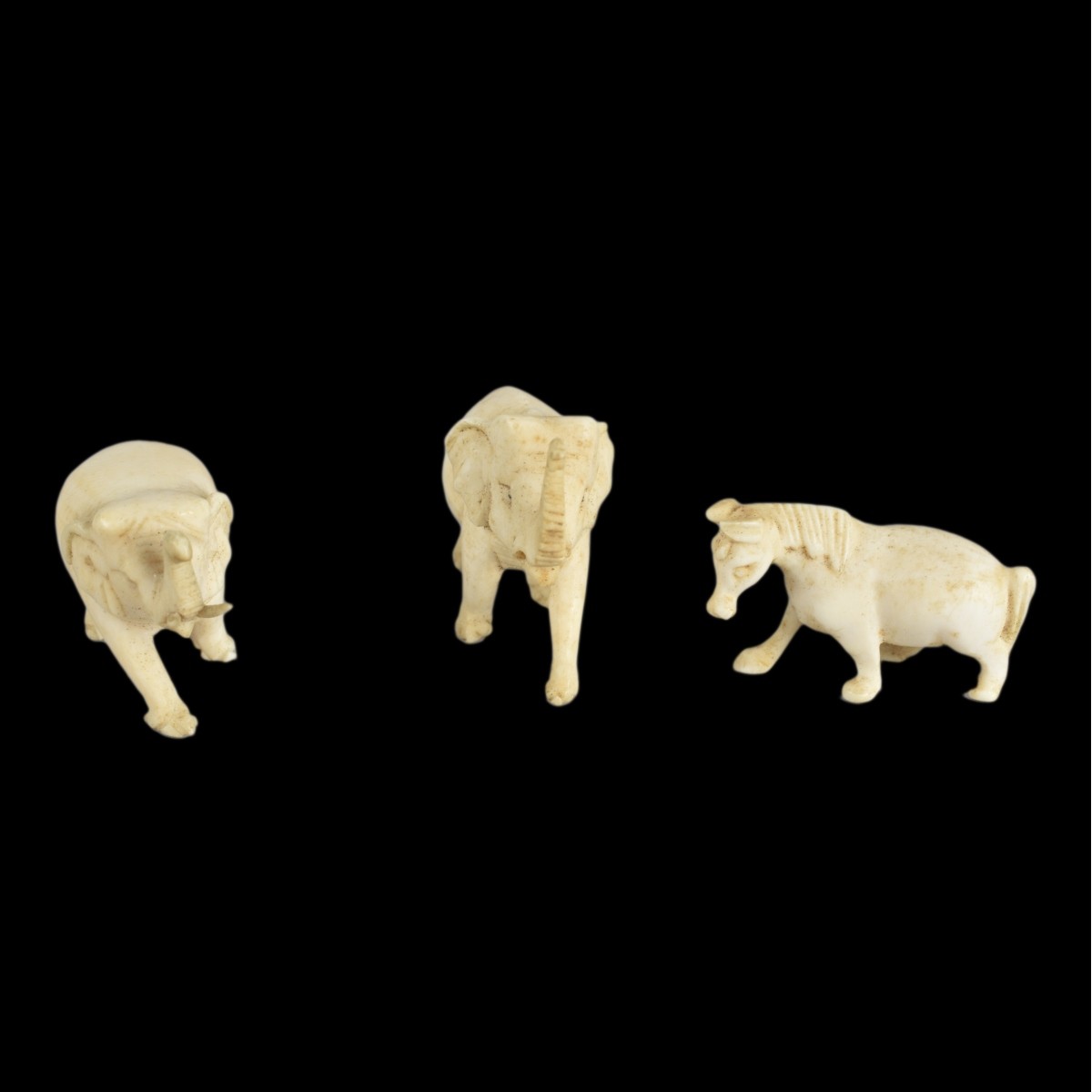 Six Vintage Carved Bone Miniature Figurines