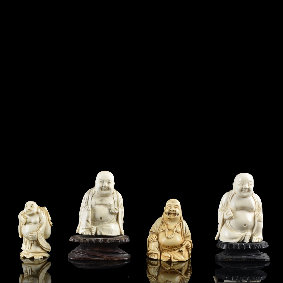 Four Chinese Carved Figurines