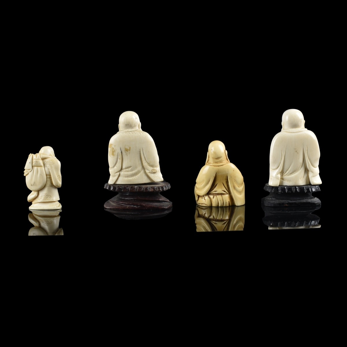 Four Chinese Carved Figurines