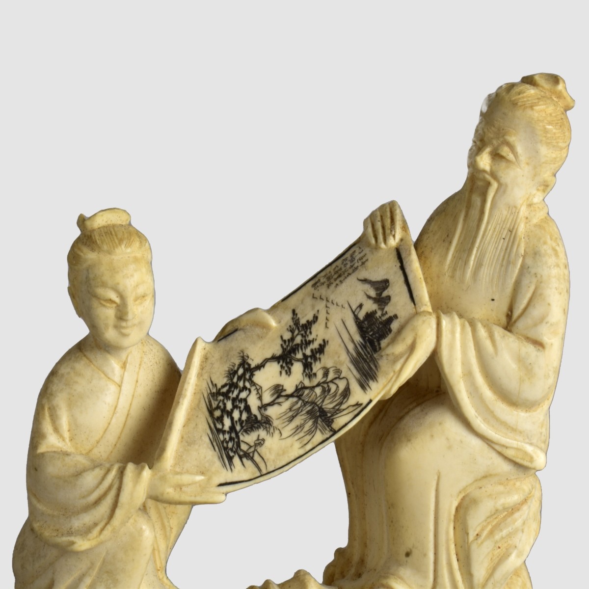 Two Oriental Carved Figurines