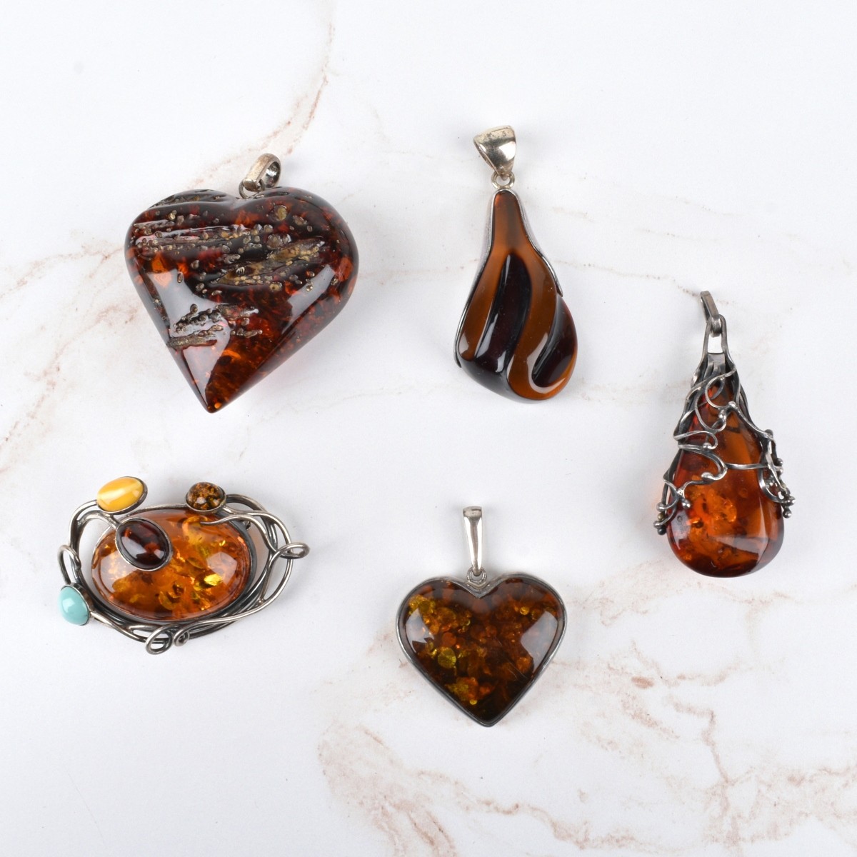 Amber and Silver Pendants
