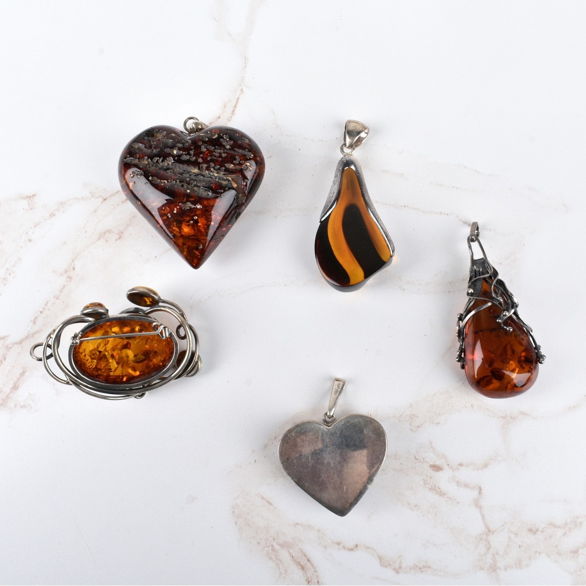 Amber and Silver Pendants
