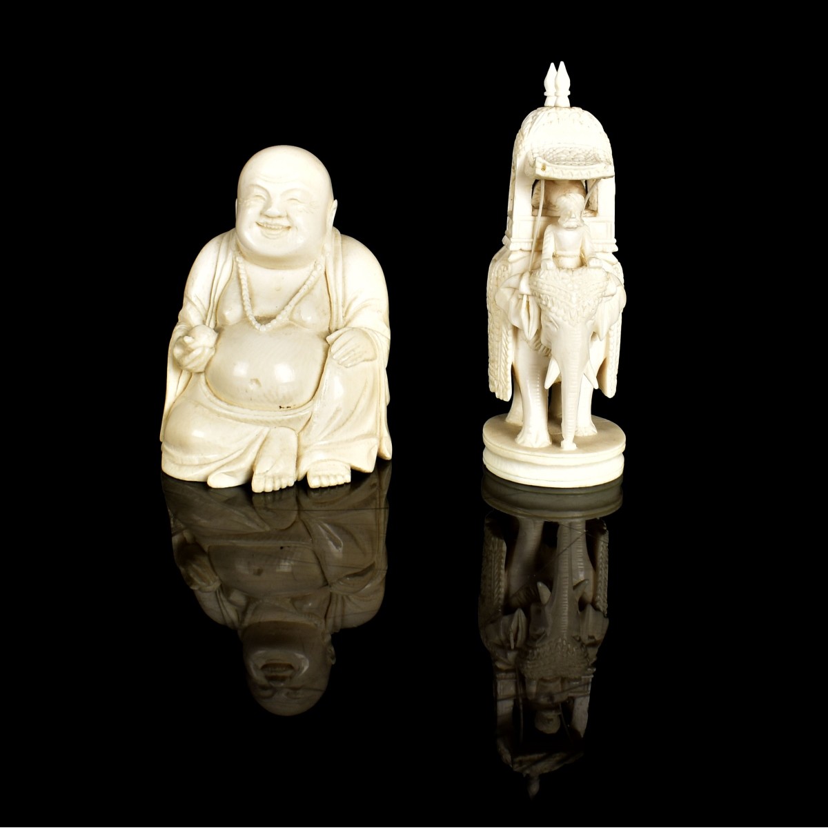 Two Carved Figurines