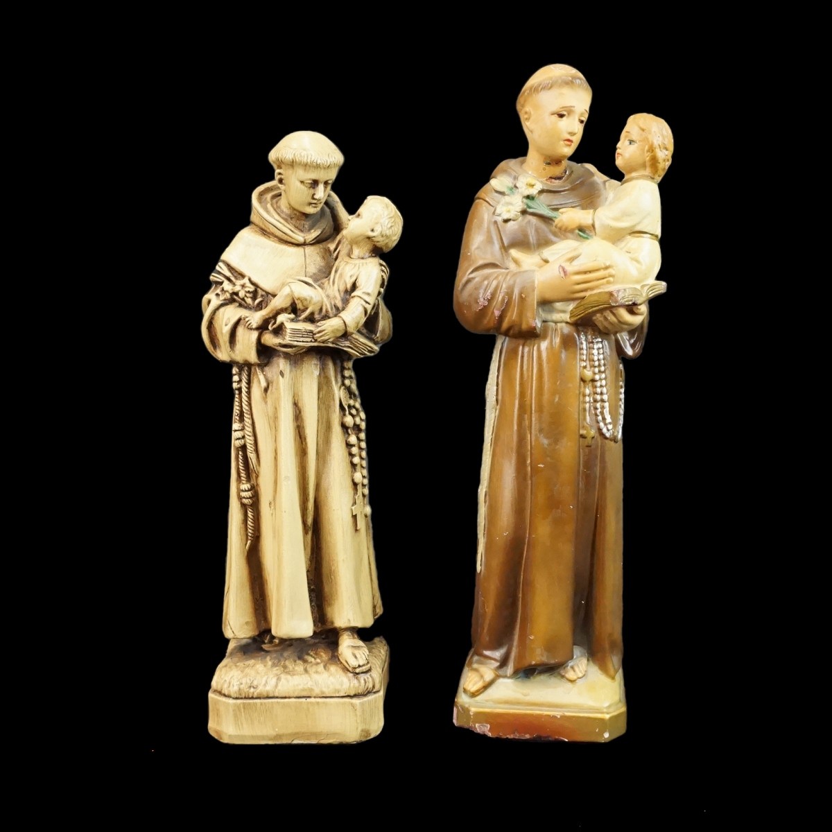 Four Santos Figurines