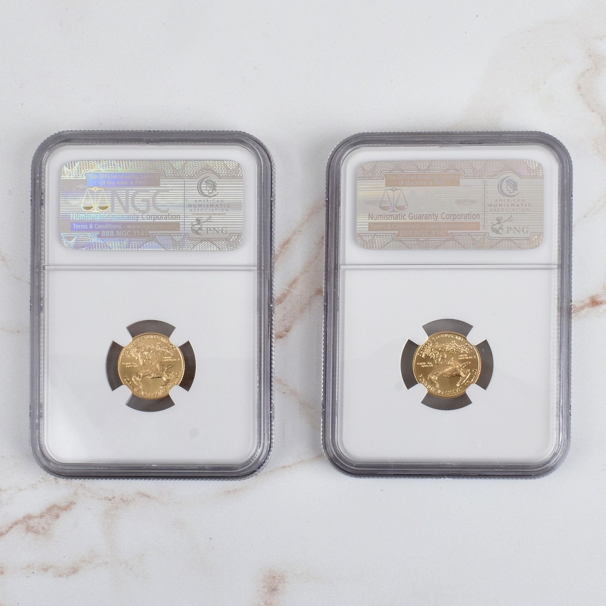 Two 2009 US $5 Gold Eagle Early Release