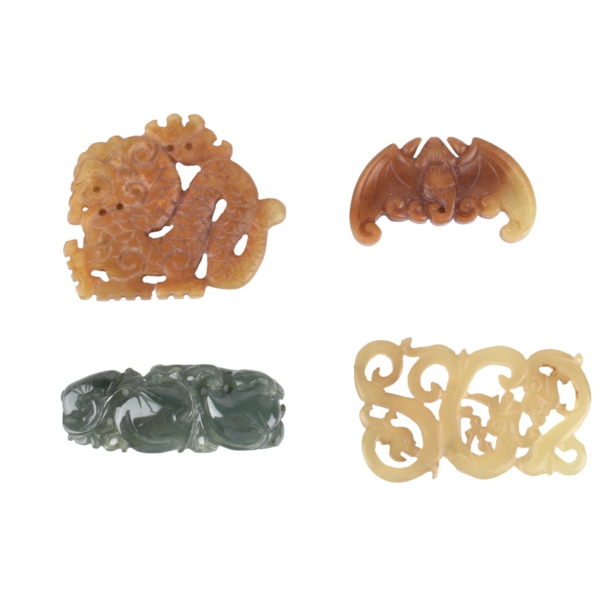 Four Jade Carved Pendants