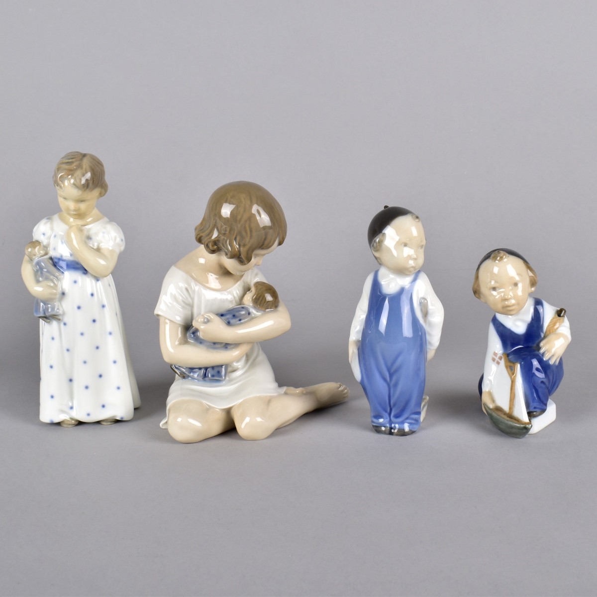 Four Vintage Royal Copenhagen Porcelain Figurines
