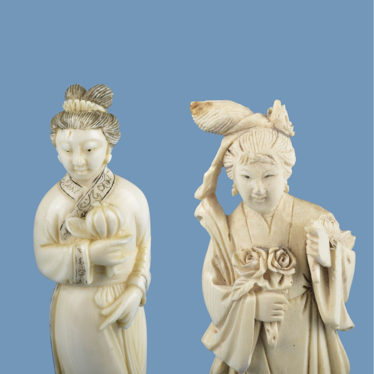 Two Antique Chinese Carved Guanyin Figurines