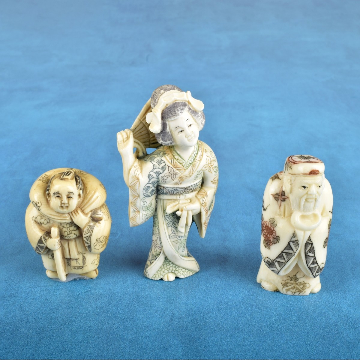 Three Antique Japanese Carved Figurines