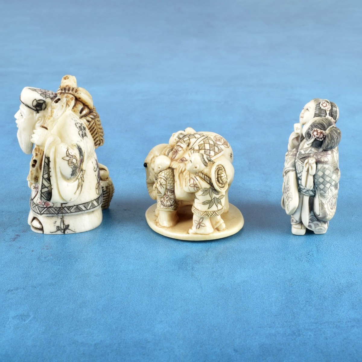 Three Antique Japanese Carved Figurines