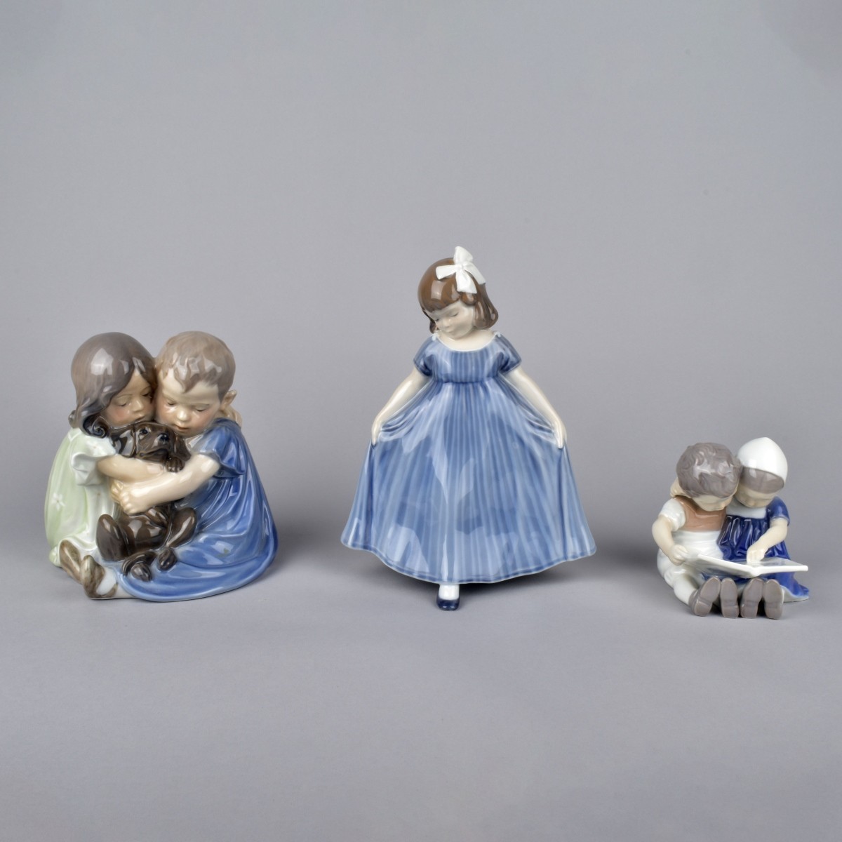 Three Vintage Glazed Porcelain Figurines