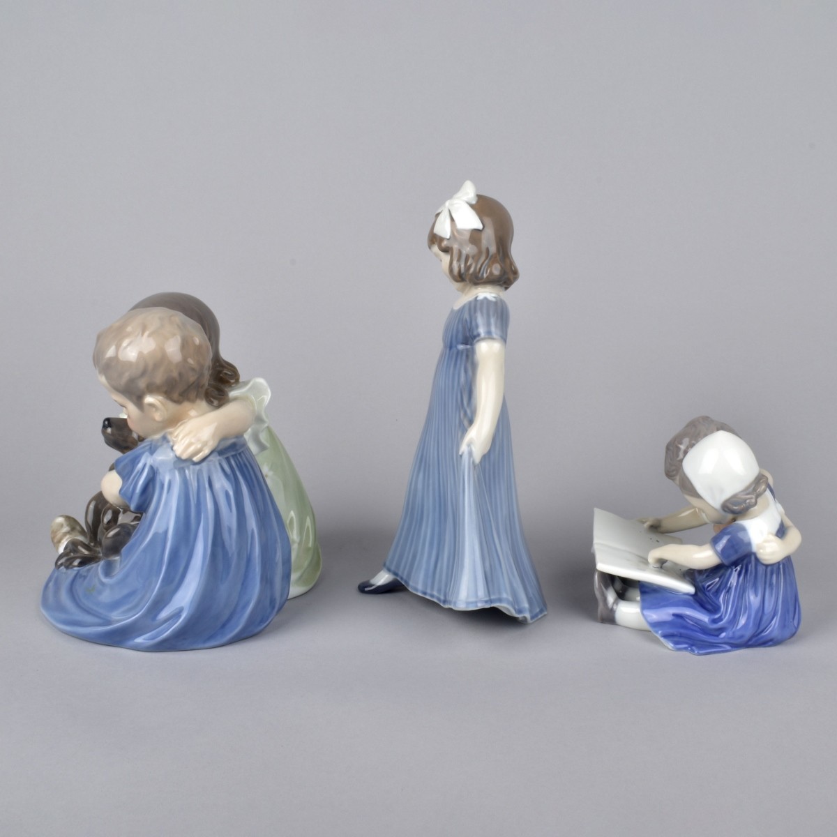 Three Vintage Glazed Porcelain Figurines