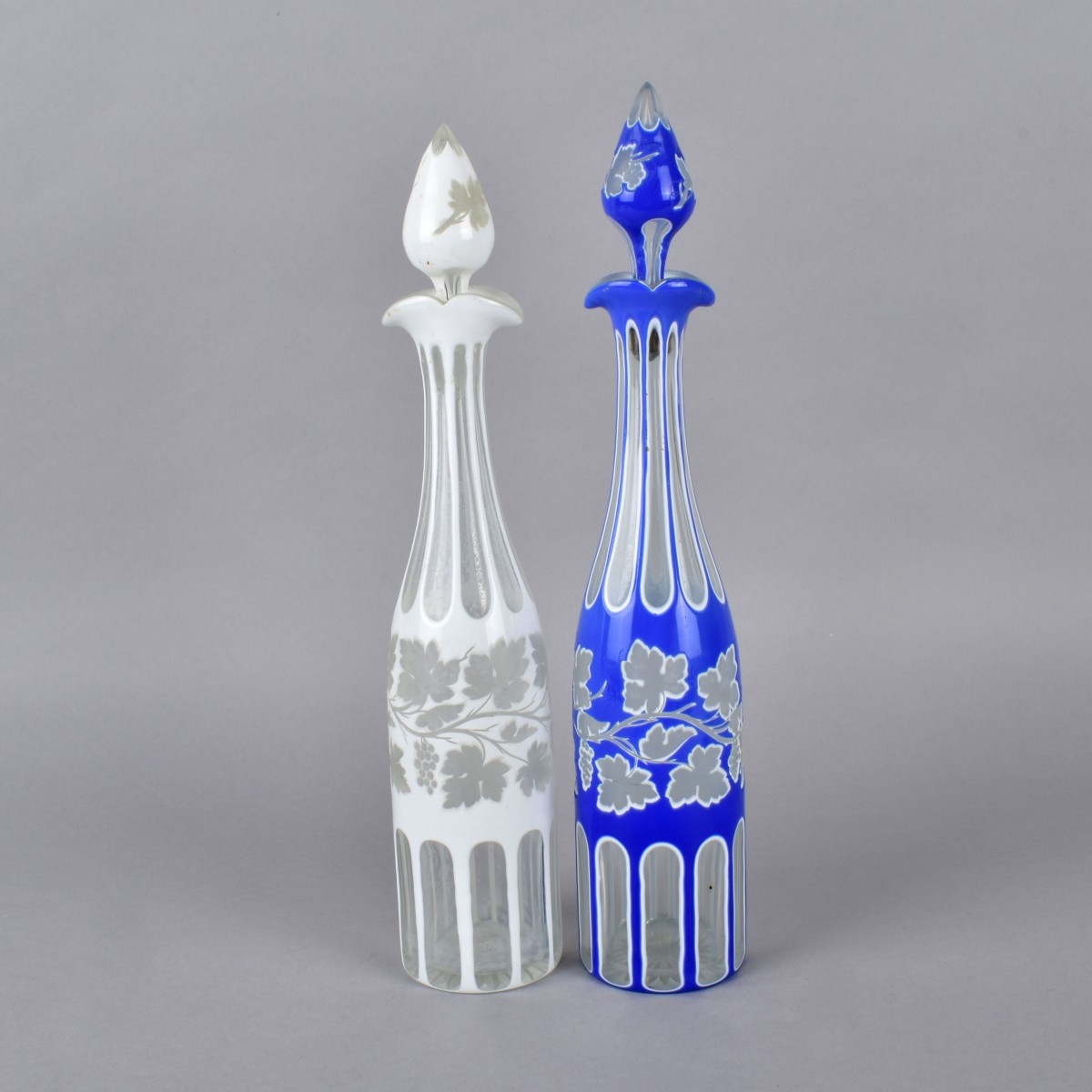 Two Bohemian Glass cut to clear Bottles