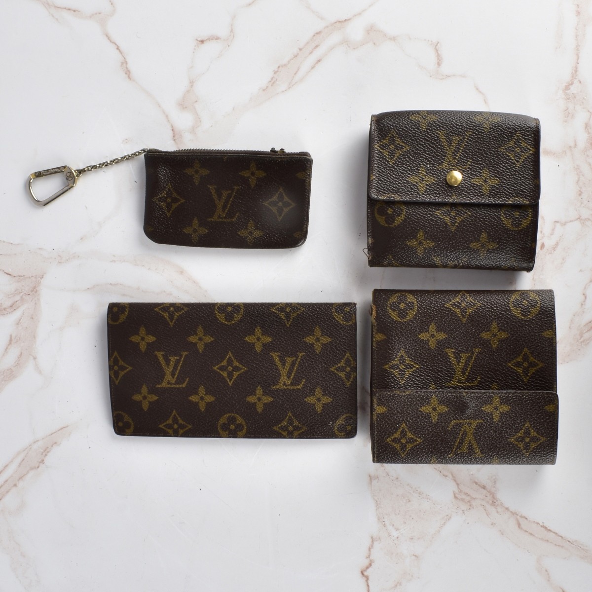 Four Louis Vuitton Monogram Accessories