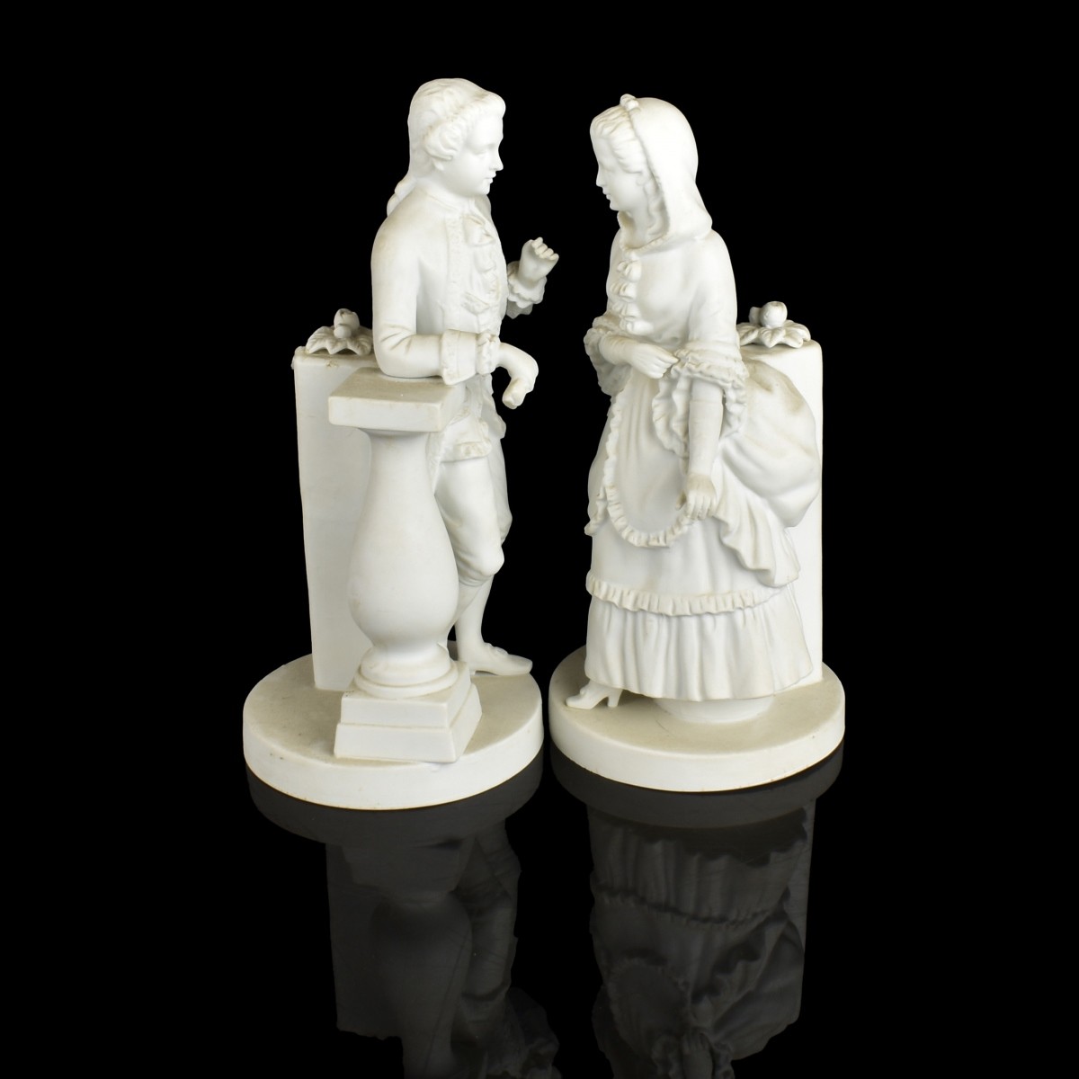 Pair of Vintage Bisque Porcelain Figurines