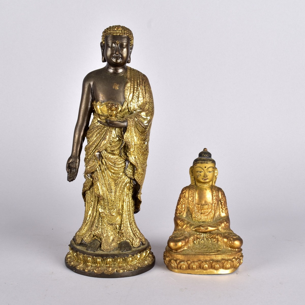 Two Oriental Bronze Sculptures