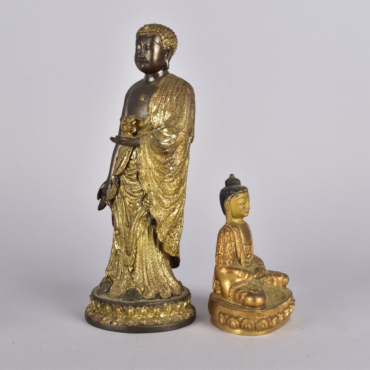 Two Oriental Bronze Sculptures