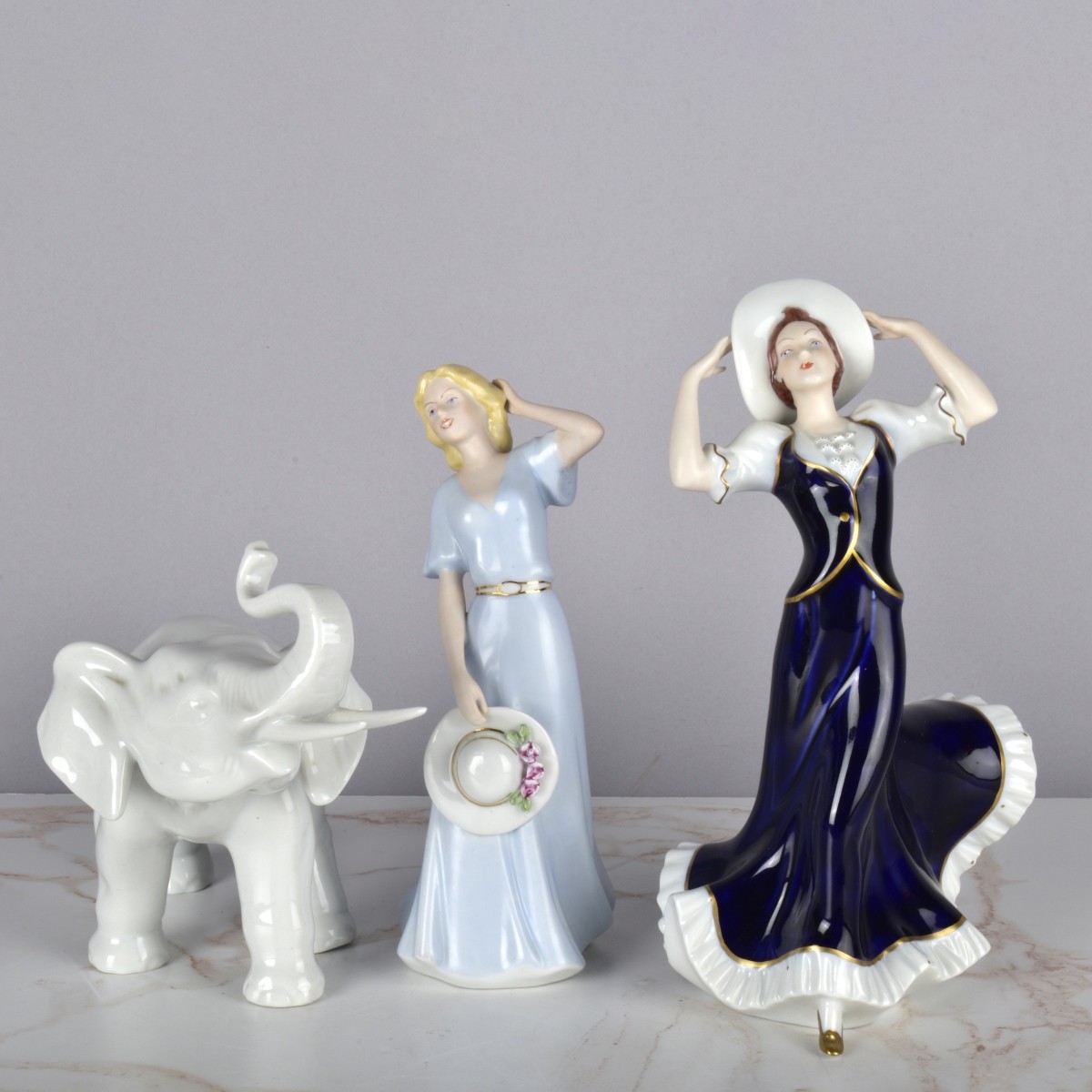 Three Royal Dux Porcelain Figurines