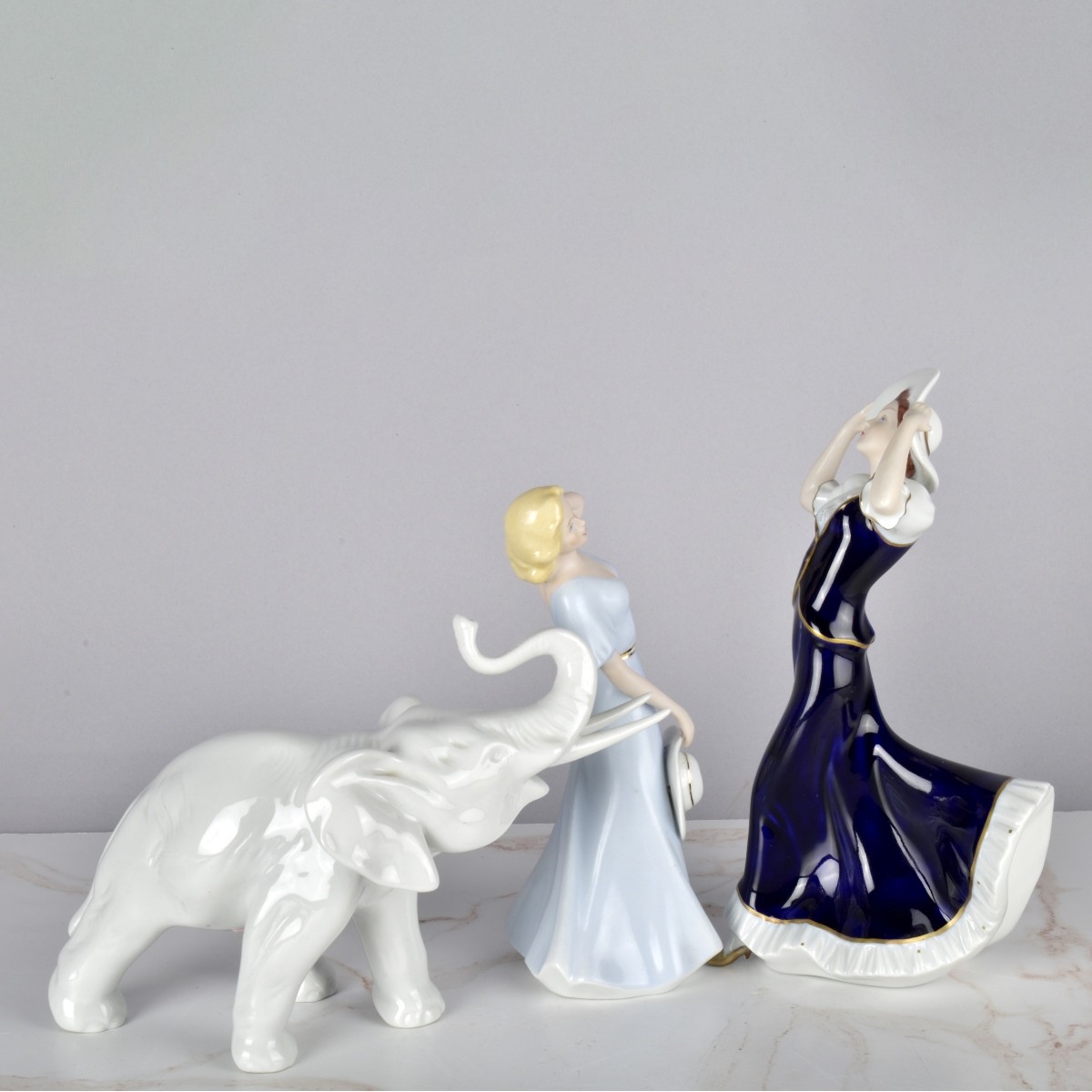 Three Royal Dux Porcelain Figurines