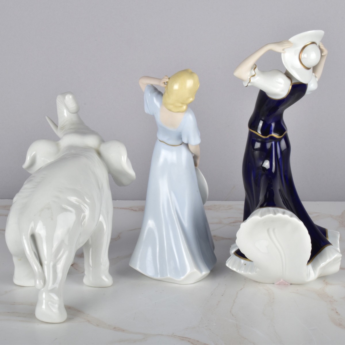 Three Royal Dux Porcelain Figurines