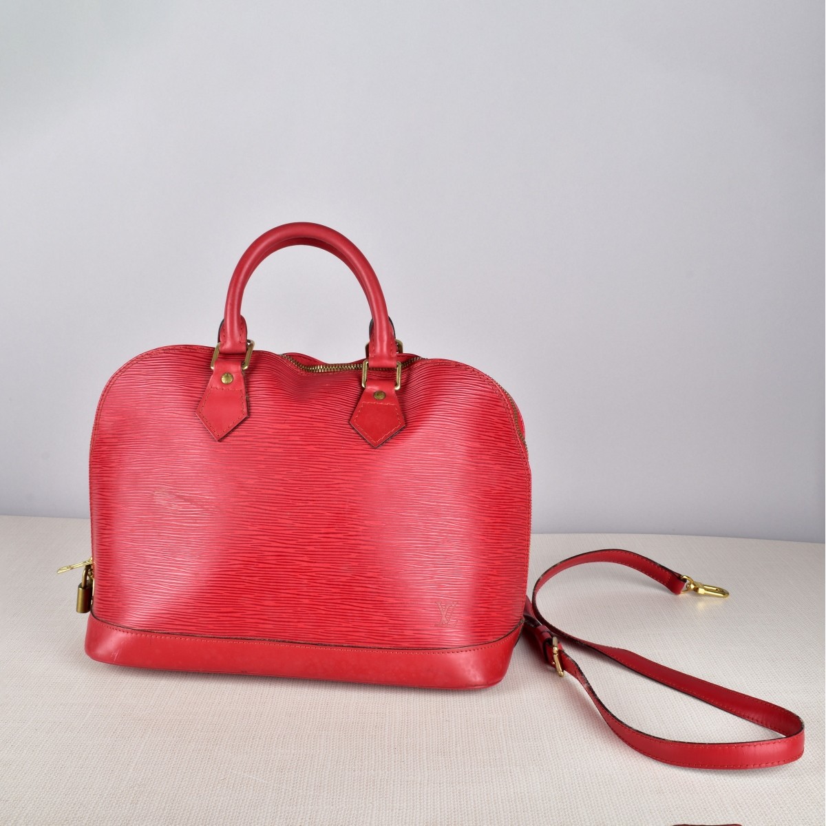 Louis Vuitton Alma EPI Red Handbag