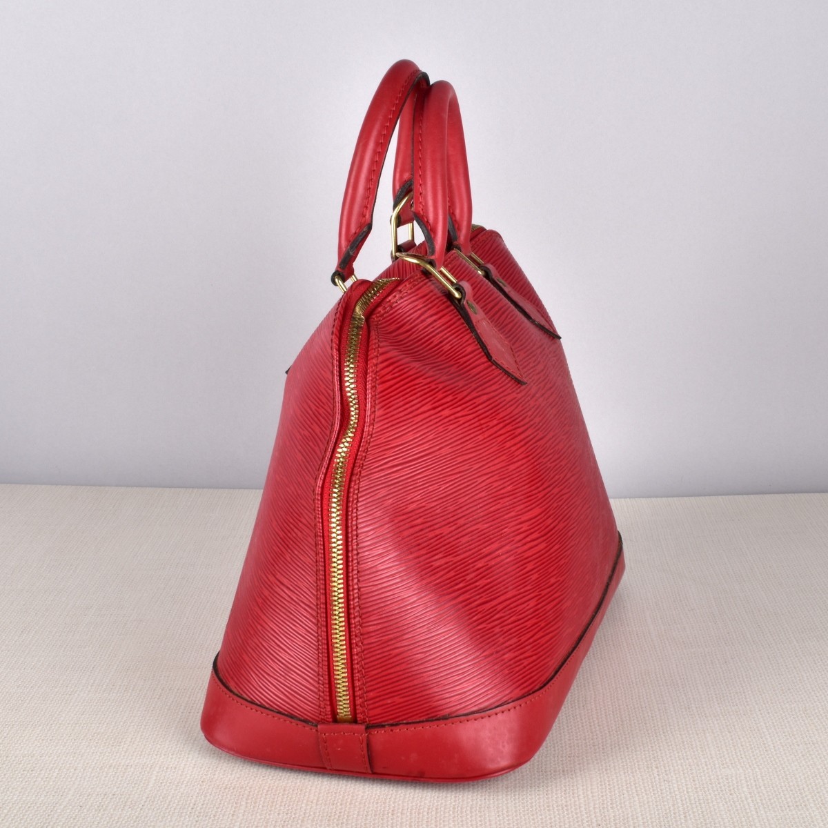 Louis Vuitton Alma EPI Red Handbag