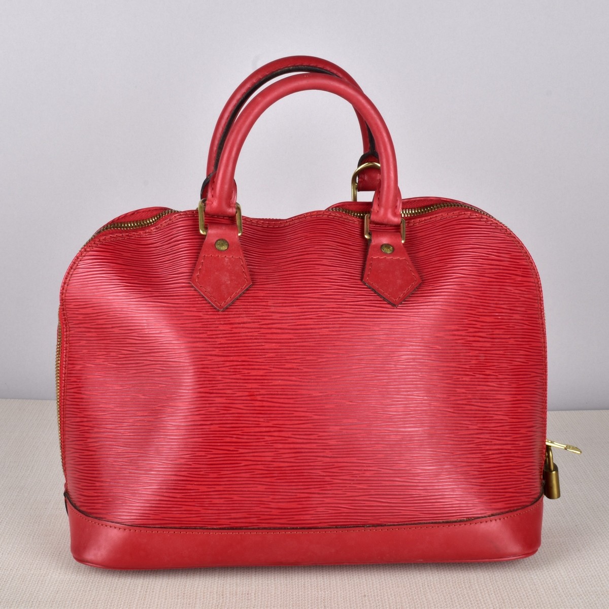 Louis Vuitton Alma EPI Red Handbag