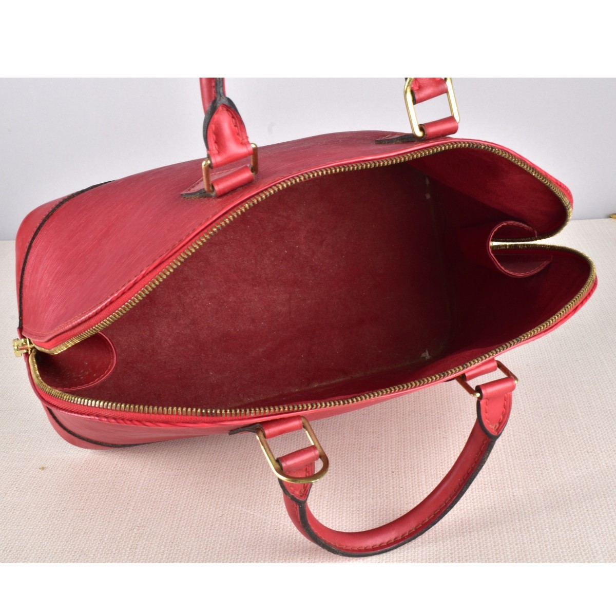 Louis Vuitton Alma EPI Red Handbag