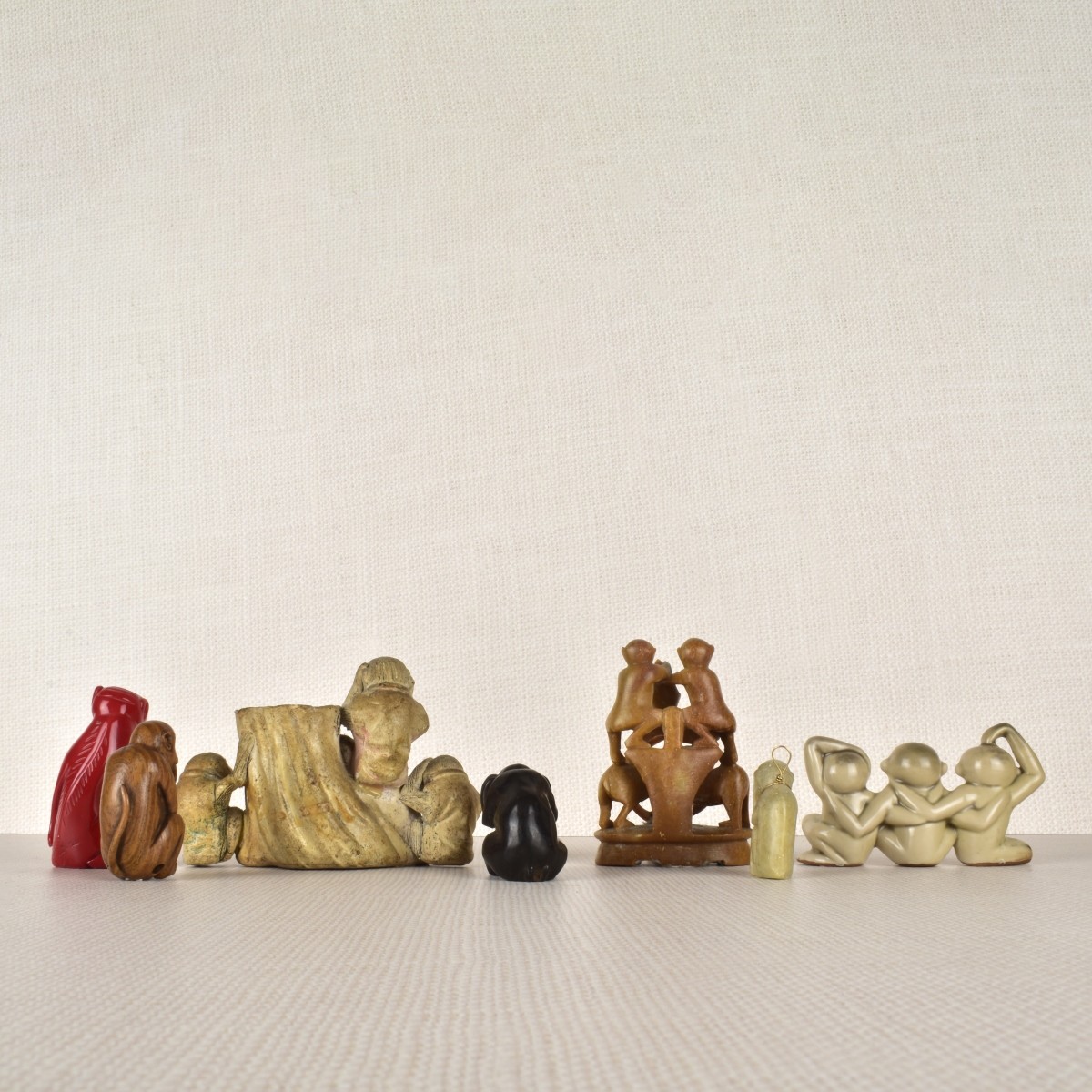 Seven Monkey Figurines