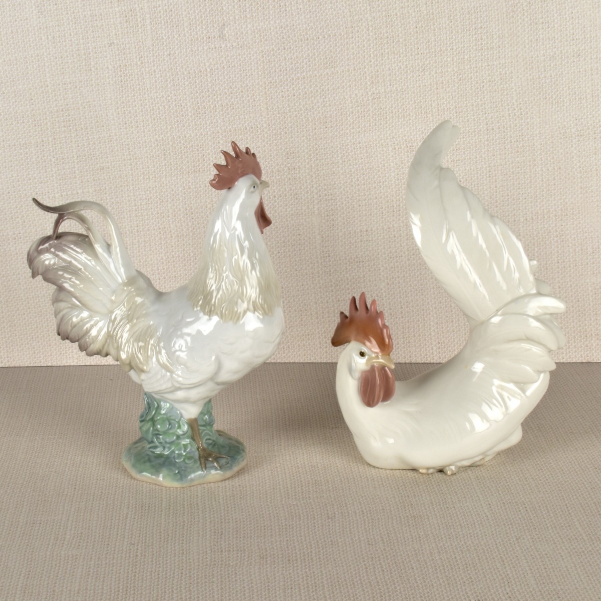 Two Lladro Porcelain Rooster Figurines